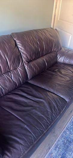 Dark brown leather sofa
