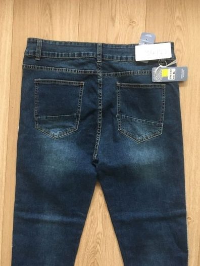 Melbourne designer denim cotton jeans 34 waist elasticated and 27 inch leg new with tags FREE STANDARD POSTAGE INCLUDED
