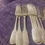 12 Irish sterling forks made by Irish silversmiths in the early 1800s with clear full hallmarks all with the same family crest weighing 820 grams almost 29 ounces Image 5