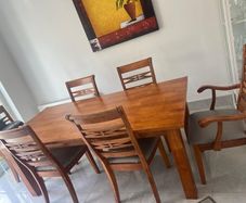 Large solid table and six chairs