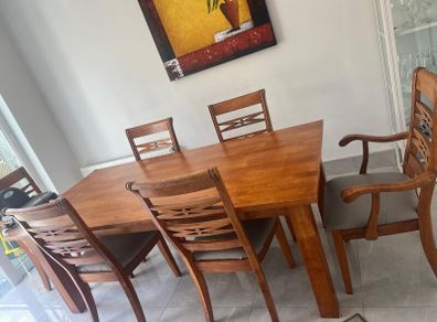 Large solid table and six chairs