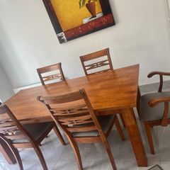 Large solid table and six chairs