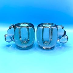 Vintage art glass candlesticks shaped like a hippopotamus