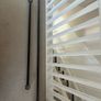 Two black curtain poles Image 2