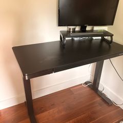 Height adjustable office desk