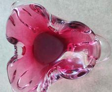 Cranberry pink art glass ashtray Murano style layered glass.