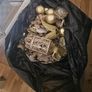 Black Sack of Christmas Decorations Image 2