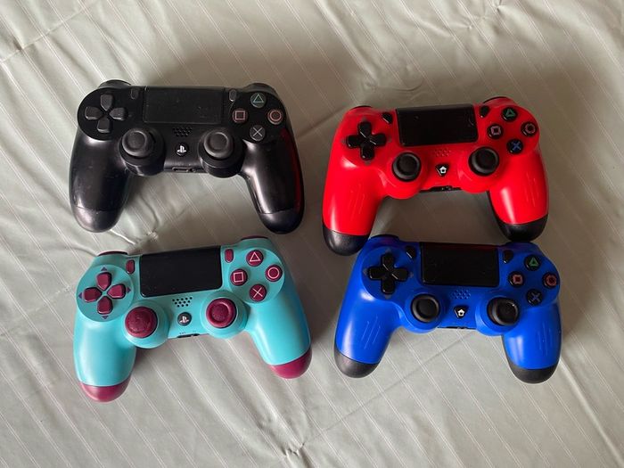 PlayStation 4 PS4 Console with controllers