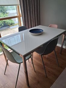 Contemporary white top dining table