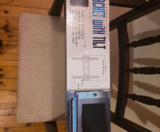 Universal TV wall mounting bracket with adjustable tilt.