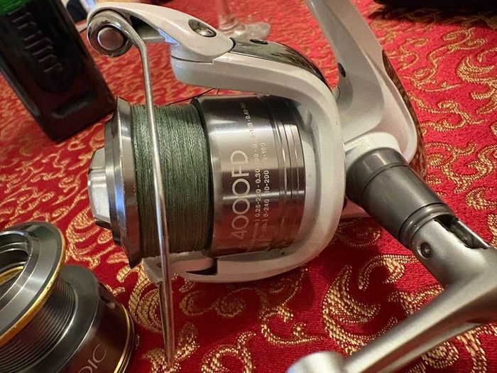 shimano stradic 4000 with spare spool and spiderwire braid