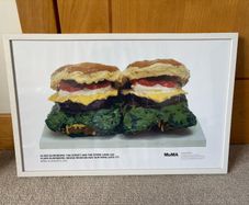 A Framed Print of Claes Oldenburg's iconic Pop Art sculpture "Two Cheeseburgers, with Everything (Dual Hamburgers)