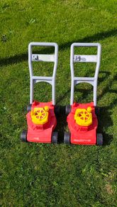 Toy lawnmowers x2