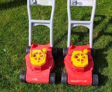 Toy lawnmowers x2