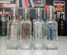 141 - Set of 4 Vintage Cork Distilleries Company Whisky Small Collectible Decorative Clear Glass Bottle