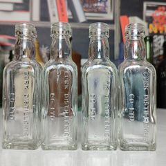 141 - Set of 4 Vintage Cork Distilleries Company Whisky Small Collectible Decorative Clear Glass Bottle