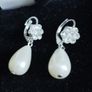 Elegant drop pearl earrings. Image 2