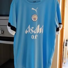 Manchester City Puma Asahi 00 top and shorts