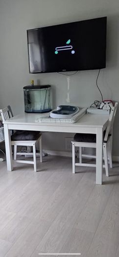 Expandable table and three chairs