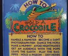 SALE!  HOW TO HOLD A CROCODILE - Hundreds Of Practical Tips, Fascinating Facts And Wicked Wisdom