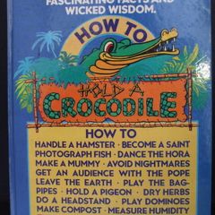 SALE!  HOW TO HOLD A CROCODILE - Hundreds Of Practical Tips, Fascinating Facts And Wicked Wisdom