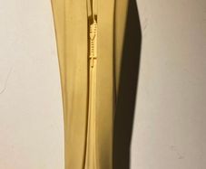 This stylized statue depicts the Virgin Mary and is typically crafted from resin or plastic, often styled after "Our Lady of Fatima".