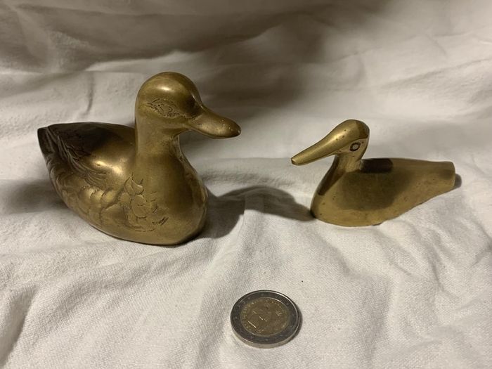 pair of brass ducks