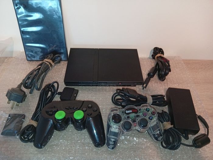 Sony Ps2 Slim  With 2 Controllers Memory Card And Loose Game