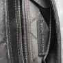 Michael Kors black crossbody bag with adjustable shoulder strap and gold-tone hardware. In great condition, only some colour fading on the logo, as shown in the photos. Image 6