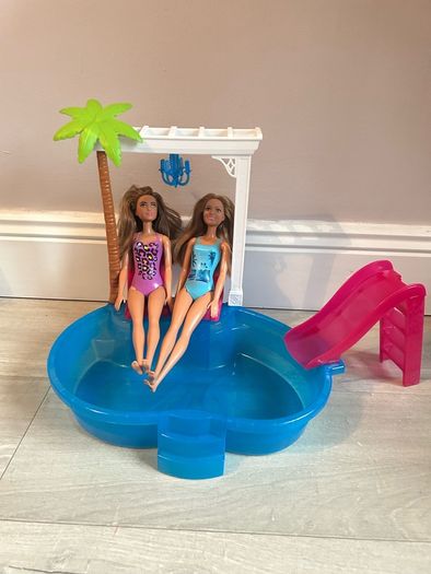 Barbie pool set plus two dolls