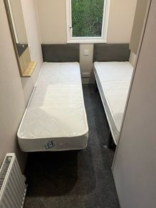 2 x single compact beds and mattress