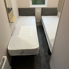 2 x single compact beds and mattress