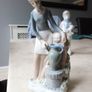 Porcelain  Figurines  X 2. Boy With  Lamb & Lady With Urn. Image 2
