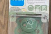 Baby outfits and soothers