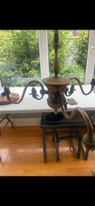 Vintage 3 arm brass chandelier with grapevine decoration.