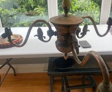 Vintage 3 arm brass chandelier with grapevine decoration.