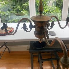 Vintage 3 arm brass chandelier with grapevine decoration.