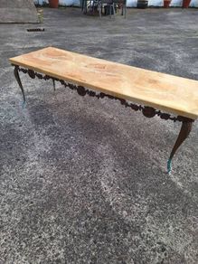 Vintage metal coffee table in need of restoration