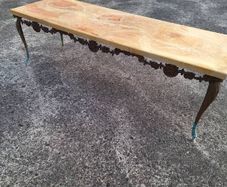 Vintage metal coffee table in need of restoration