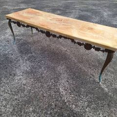 Vintage metal coffee table in need of restoration