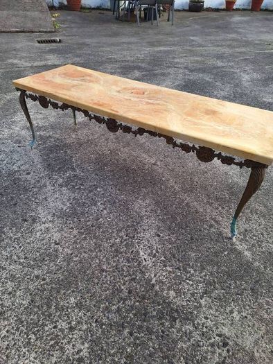 Vintage metal coffee table in need of restoration