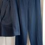 Navy pinstripe suit. Image 5