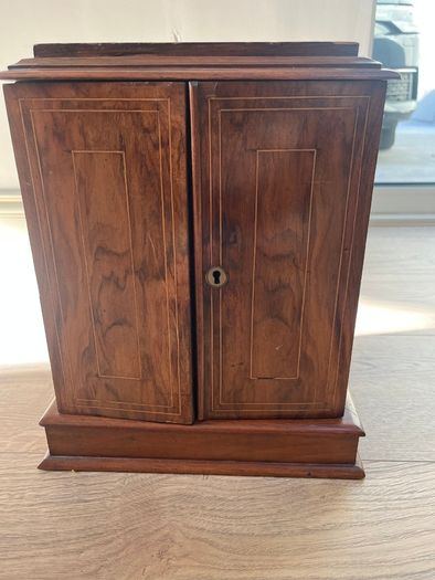 Antique collectors cabinet