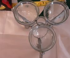white metal glass holder