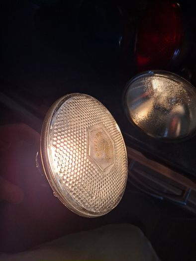 Large Theatrical or Display Lighting, including reflector lamps and colored PAR-style bulbs, with various lamp holders, plugs, and coiled electrical leads all working