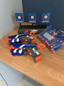 6 nerf guns, bullets and target
