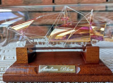 Blown Glass "Arabian Dhow" Sailing Ship Housed in Clear Glass Bottle.