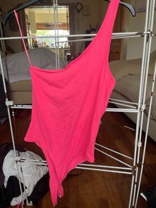 pink body suit