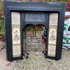 Cast Iron Stressed pine fireplace