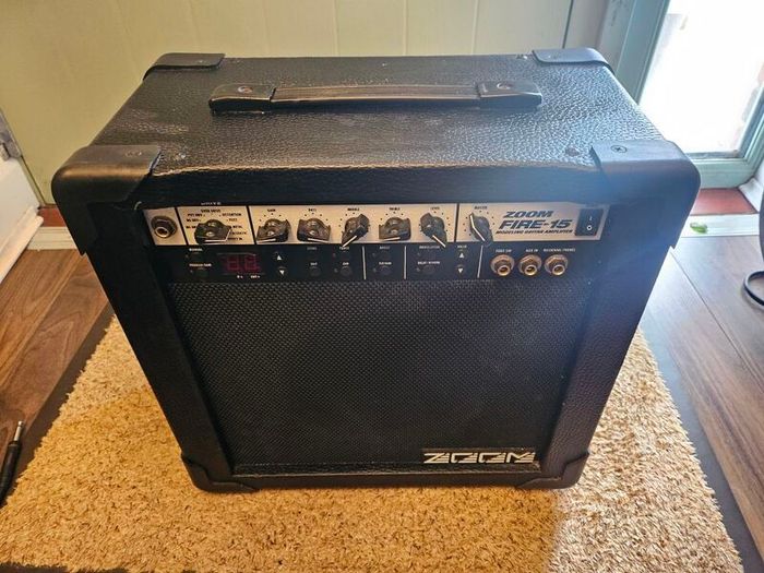 Aria electric guitar with Zoom Fire-15 Amp